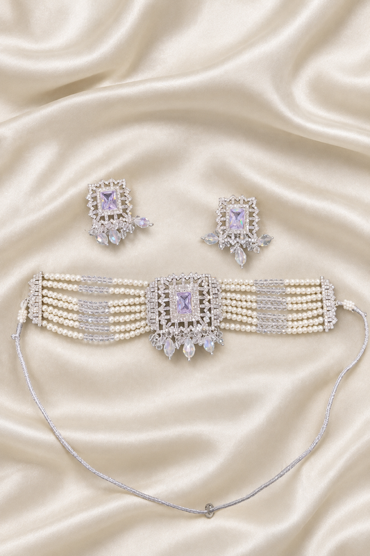 Beaded jewellery and earrings on ivory silk