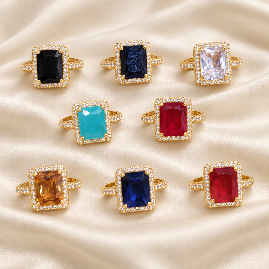 Exact-design gemstone ring collection on ivory silk