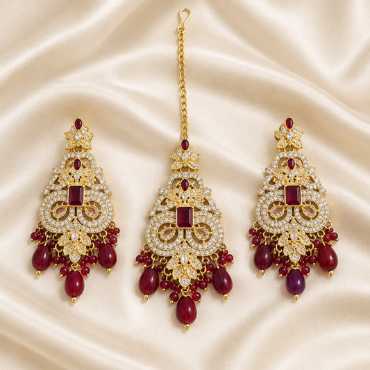 Exact-design maroon earring and teeka set on ivory silk