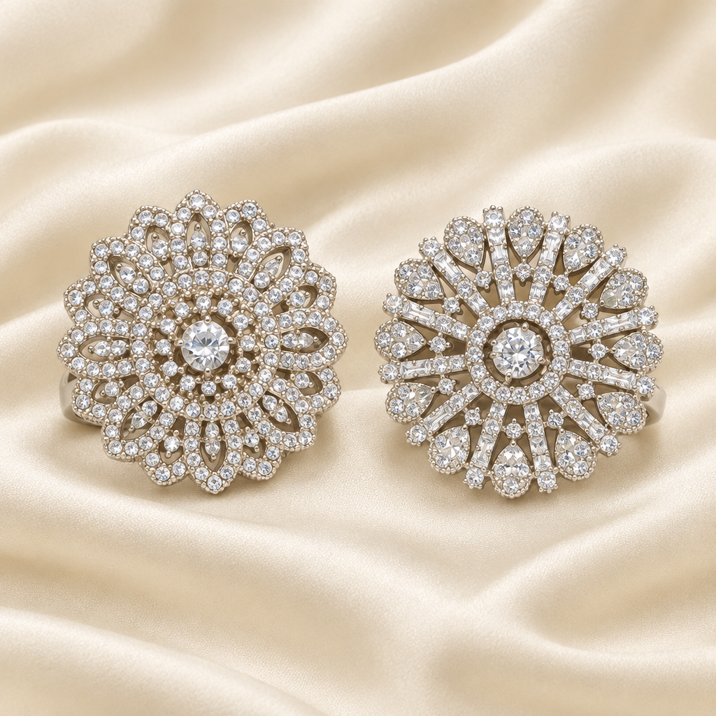 Exact-design silver statement rings on ivory silk